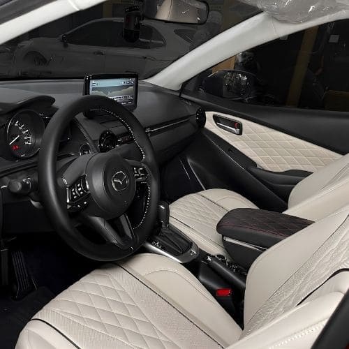 BỆ TỲ TAY MAZDA 2
