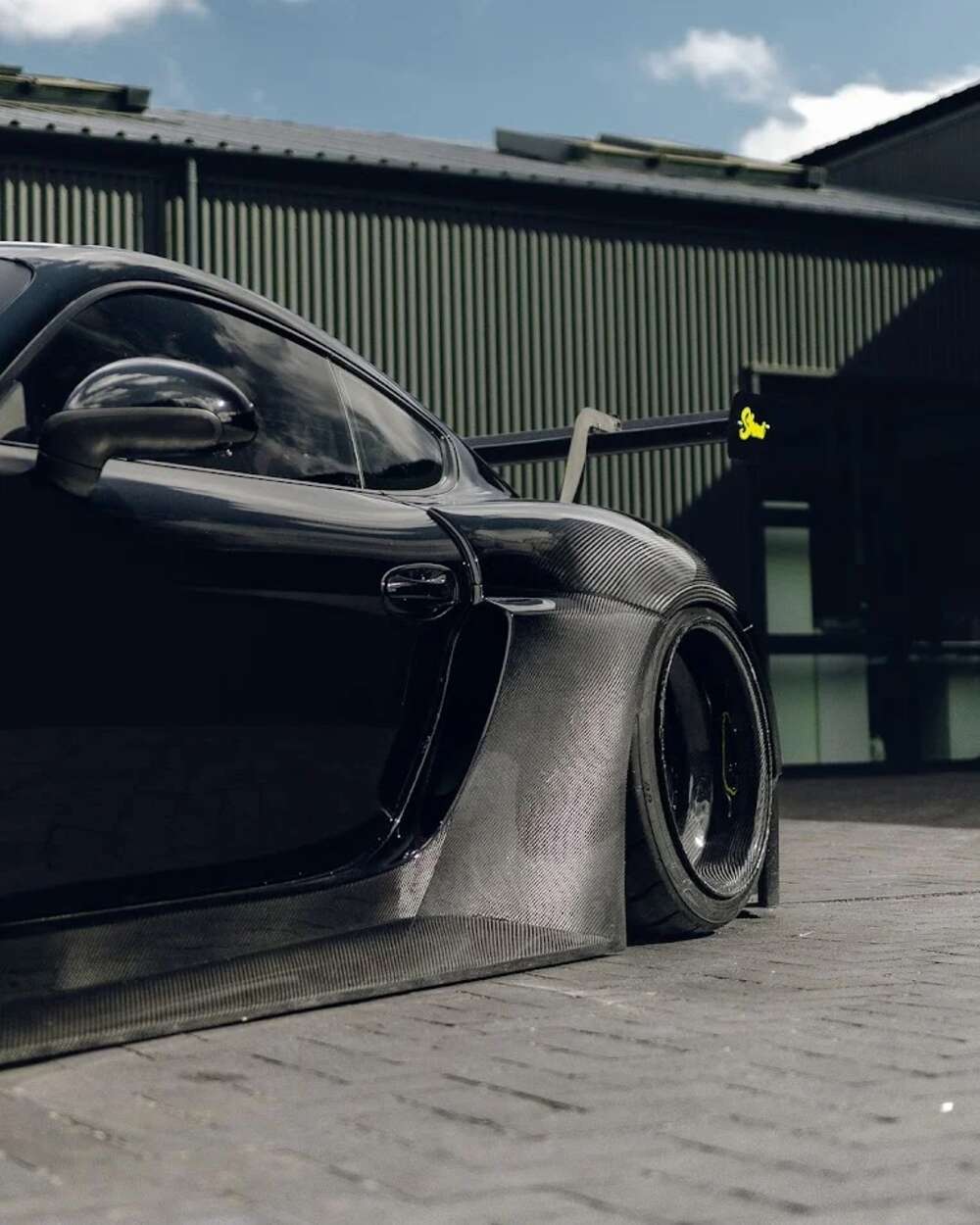 Độ Porsche Cayman wide body kit sợi carbon
