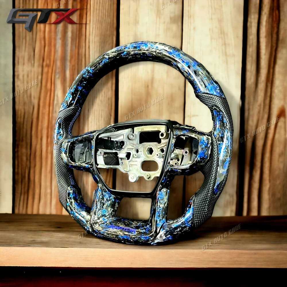 Độ vô lăng carbon Fiber xịn sò